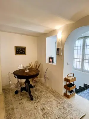a dining room with a table and chairs at GuestHost - Flaminio MM Comfy Loft - Piazza del Popolo in Rome