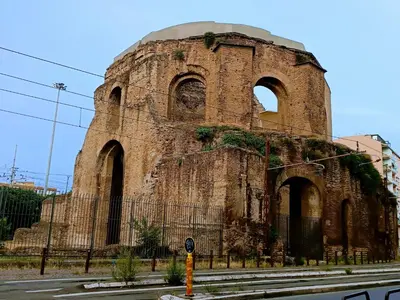 an old brick building with two arches on it at PORTA MAGGIORE 9 ROMA Locazione Turistica in Rome