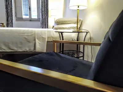 a living room with a couch and a table at NiK in Rome