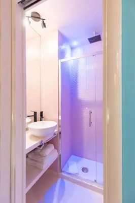 a bathroom with a sink and a shower at The 62 Home l Homkeey Apartments in Rome